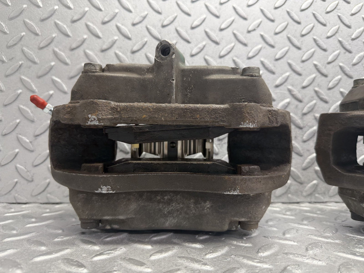 R230 front brake caliper right and left used OEM