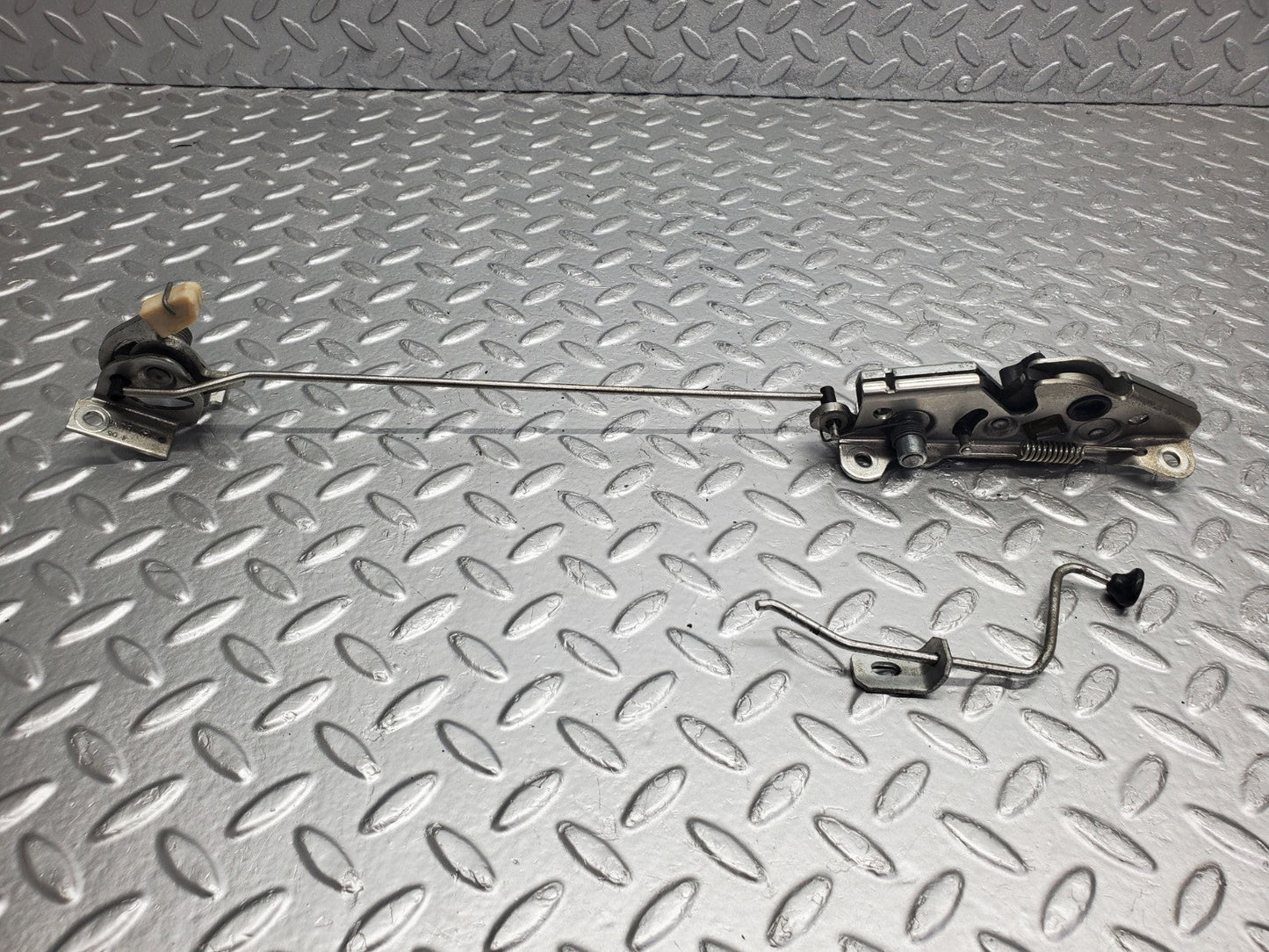 W124 Wagon rear left seat bench locking mechanism used OEM