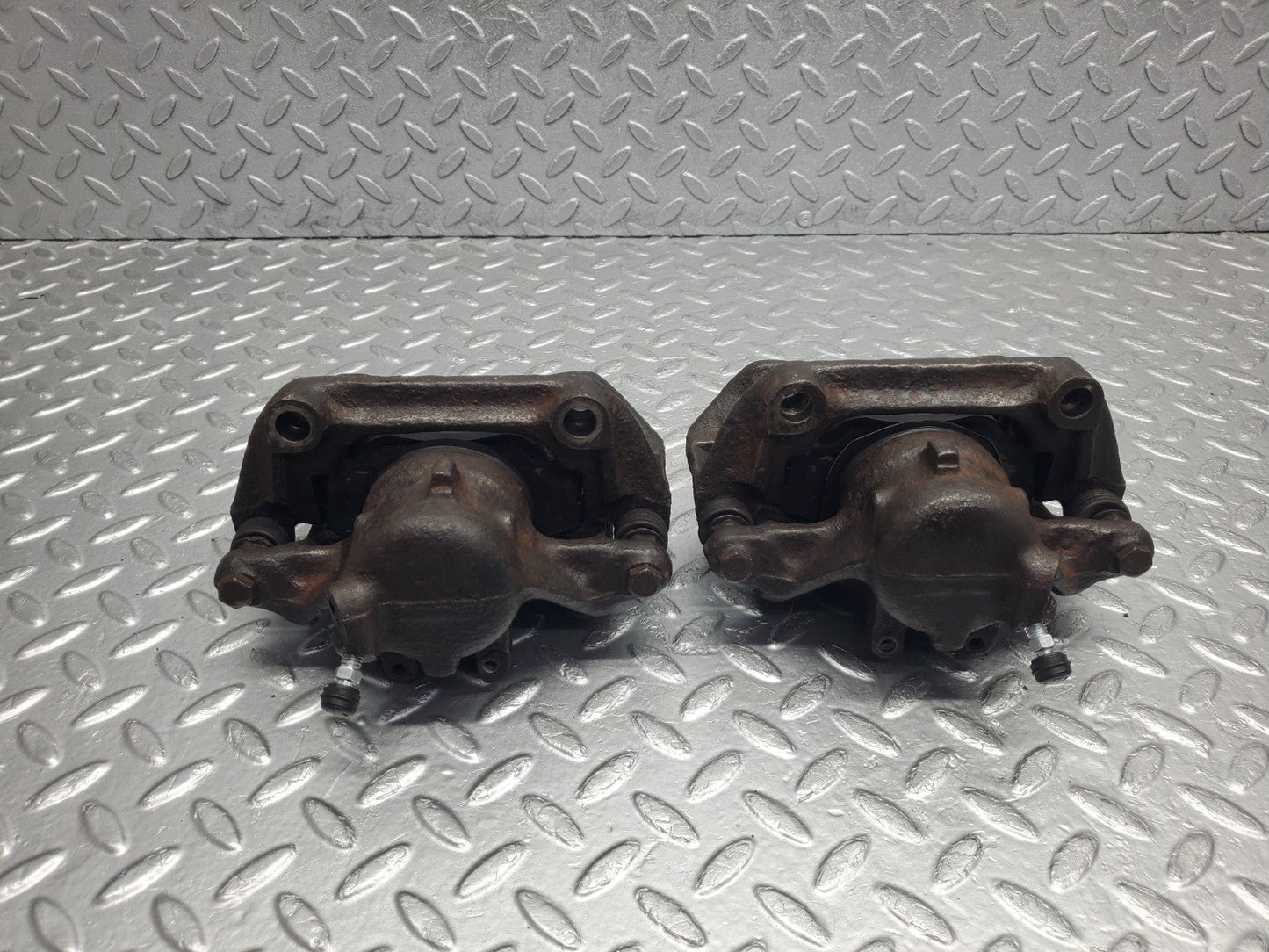 W124 Wagon front brake calipers with brackets used OEM