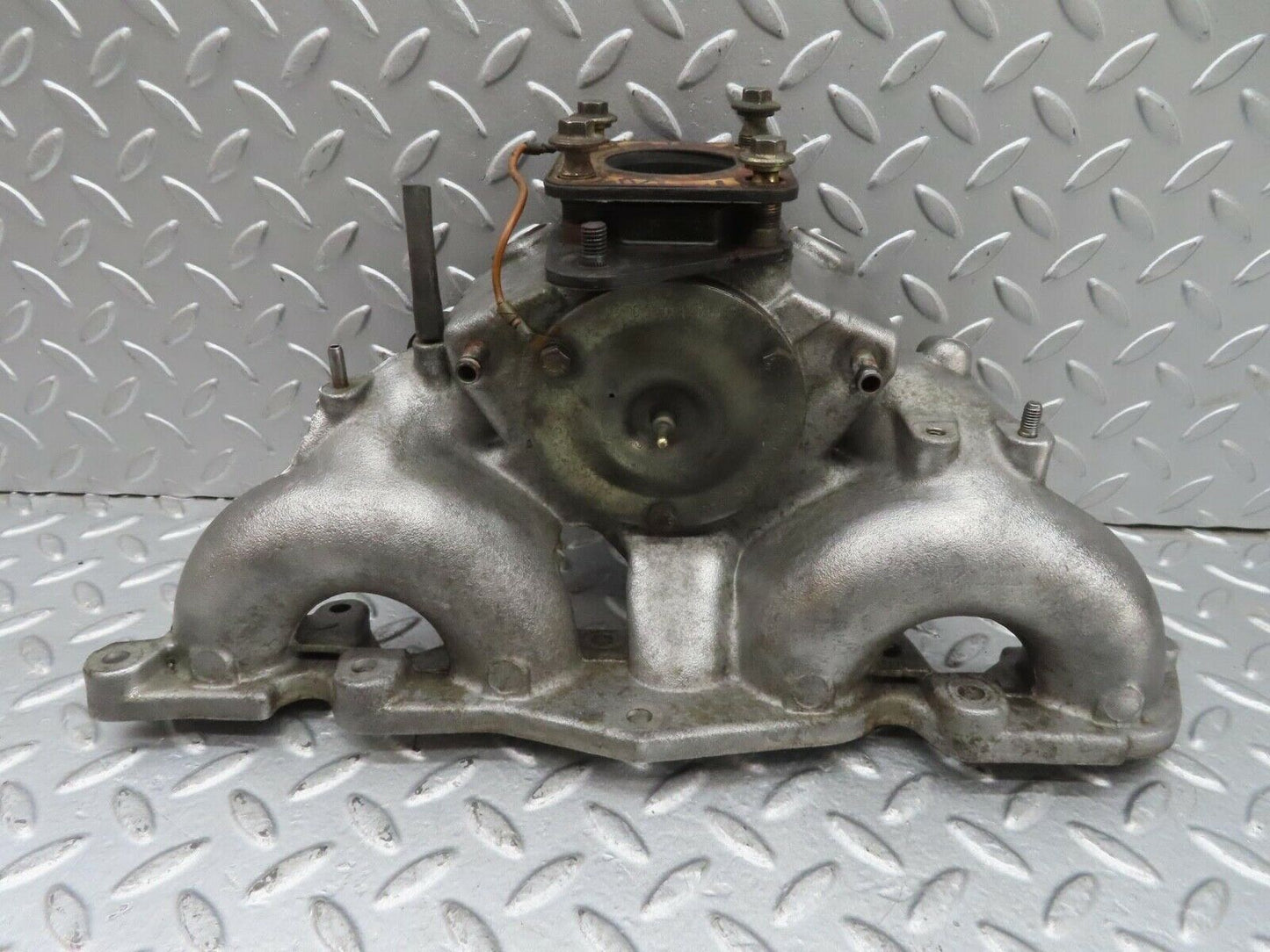 13582 Mercedes-Benz W123 200 Intake Manifold 1021411701