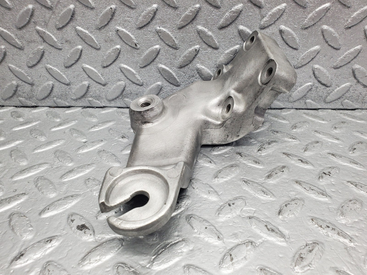 W126 Coupe engine mount bracket left used OEM