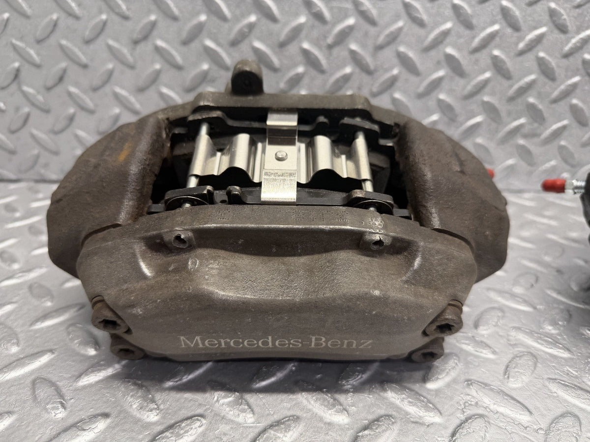 R230 front brake caliper right and left used OEM