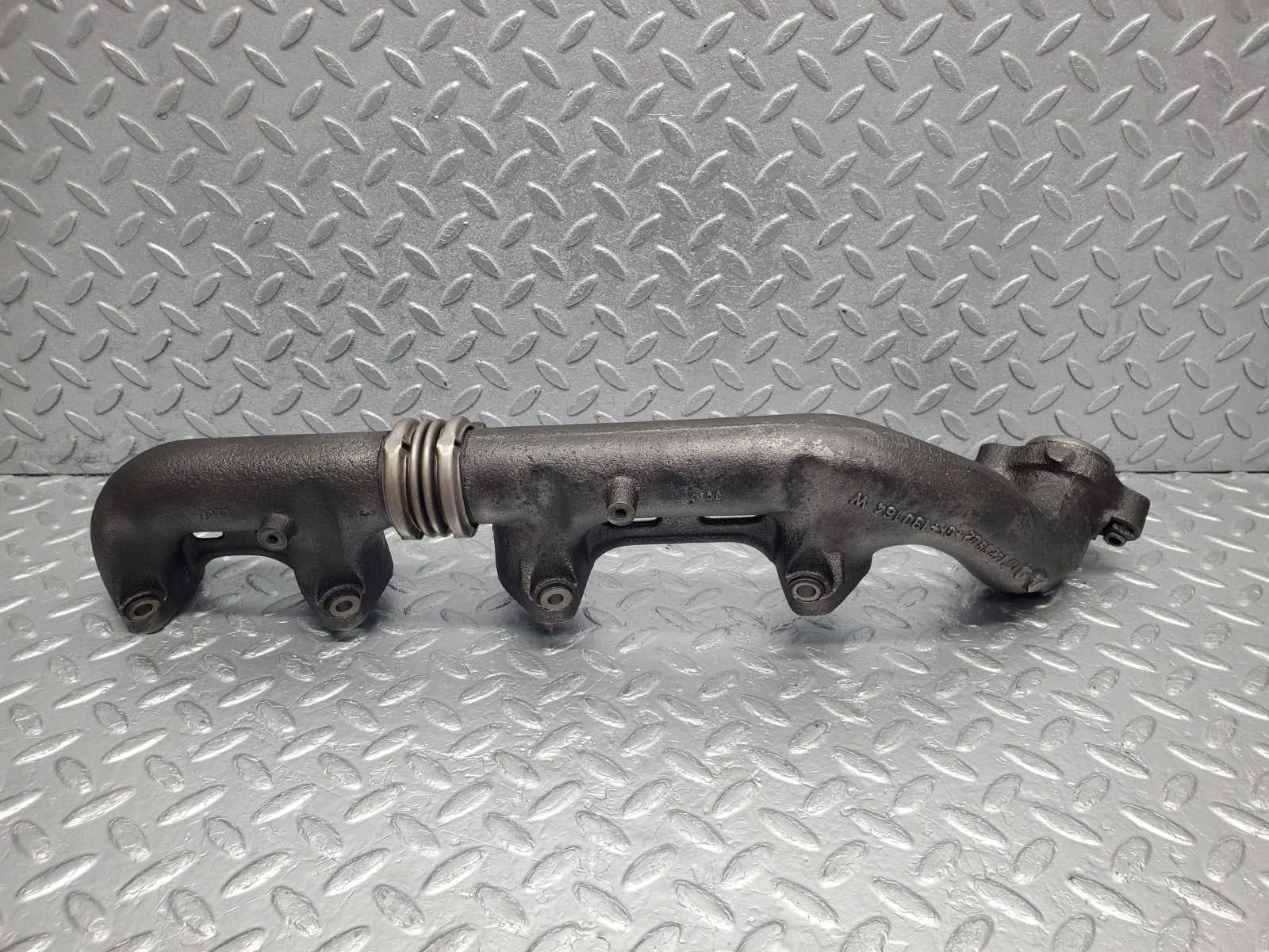 W126 Coupe exhaust manifold right used OEM