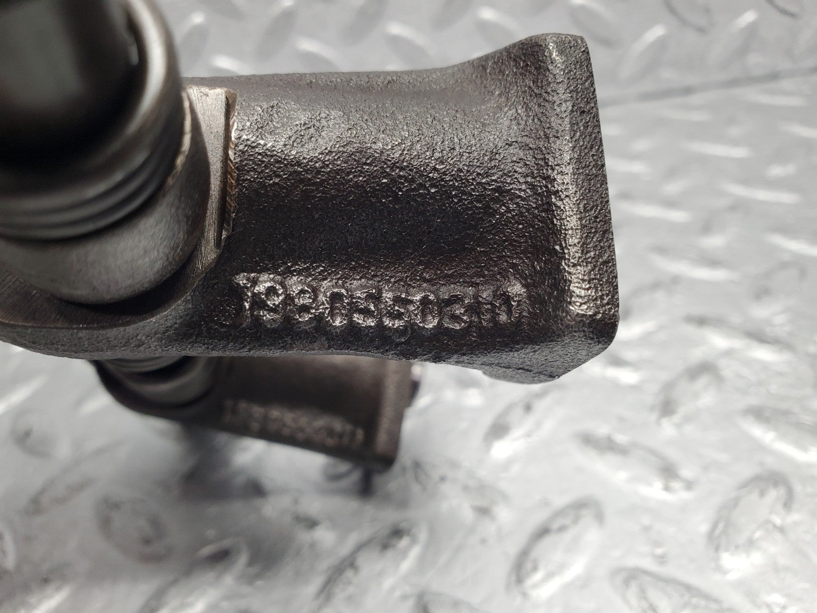 W112 rocker arm support with arm and shaft used OEM