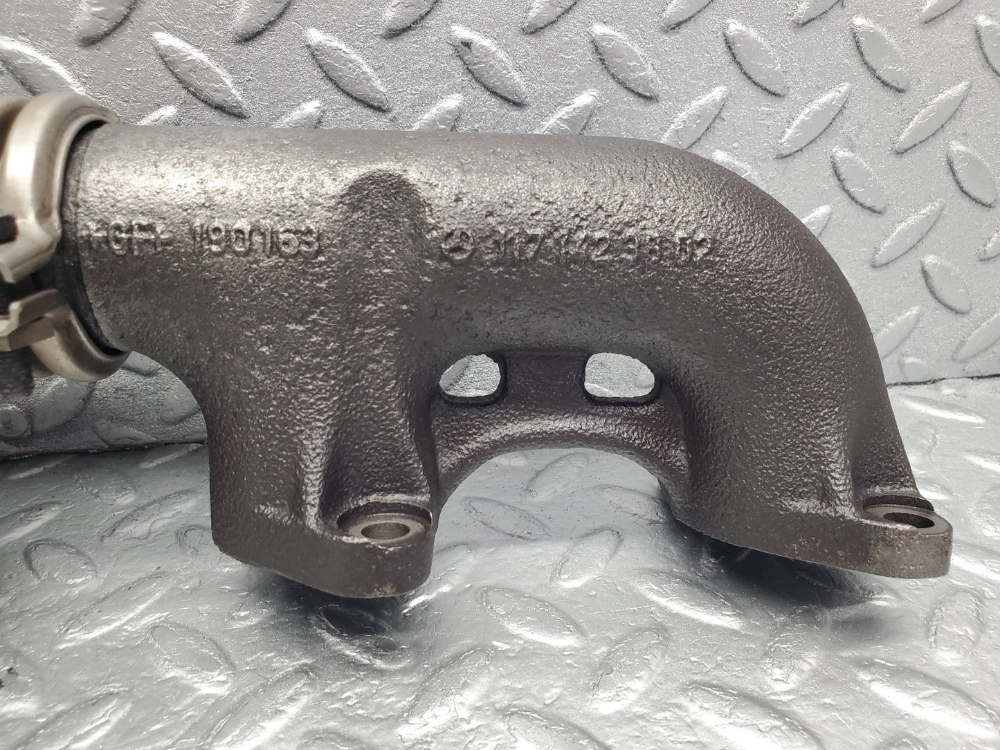 W126 Coupe exhaust manifold right used OEM