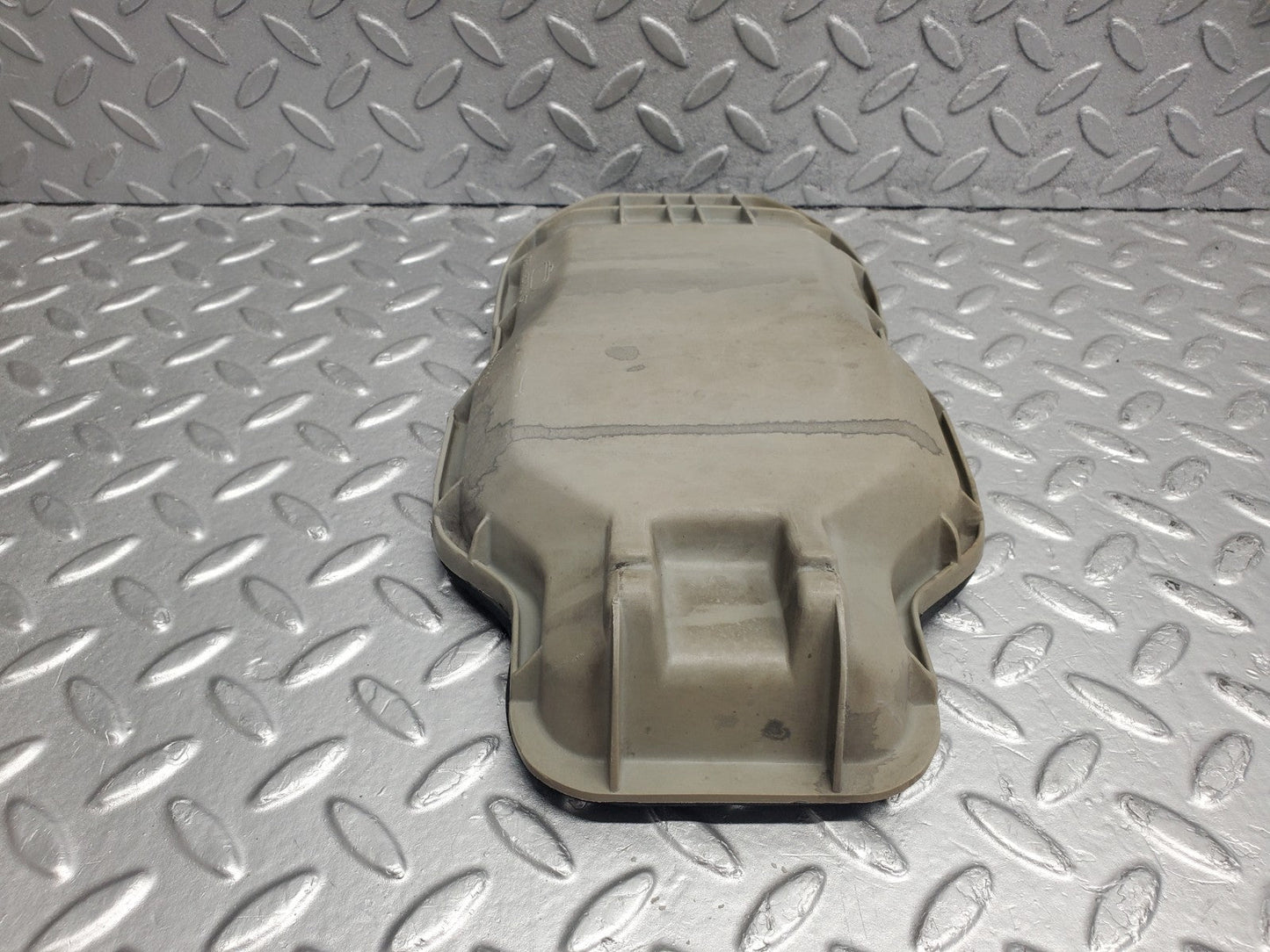 W123 headlight bulb cover left side used OEM