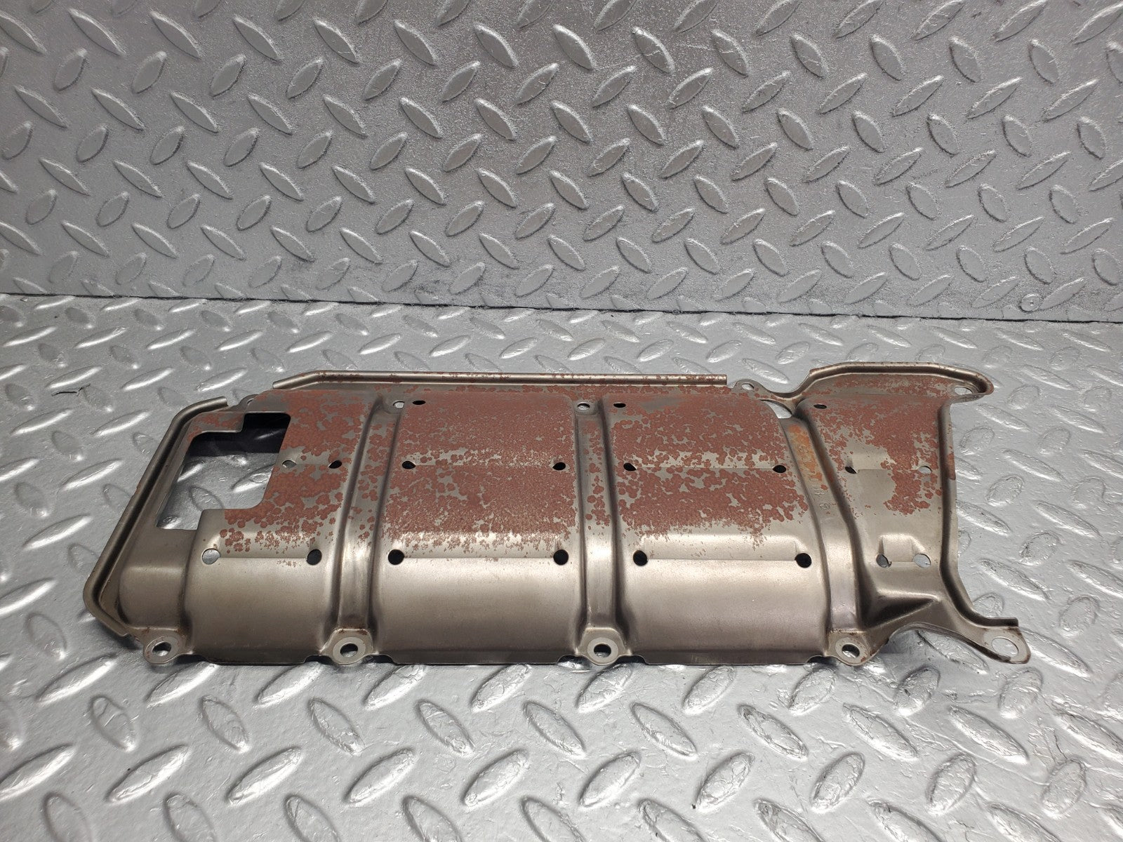 W124 Wagon baffle plate used OEM