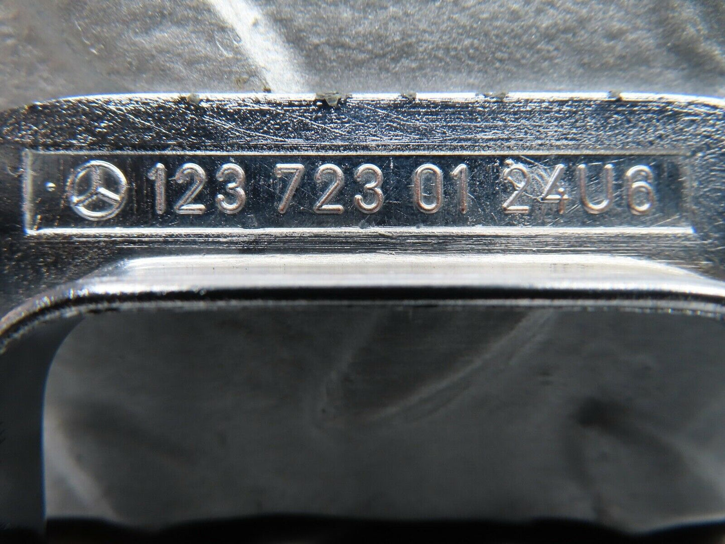21083 Mercedes-Benz W123 230E Left Chrome Door Latch Trim 1237230124