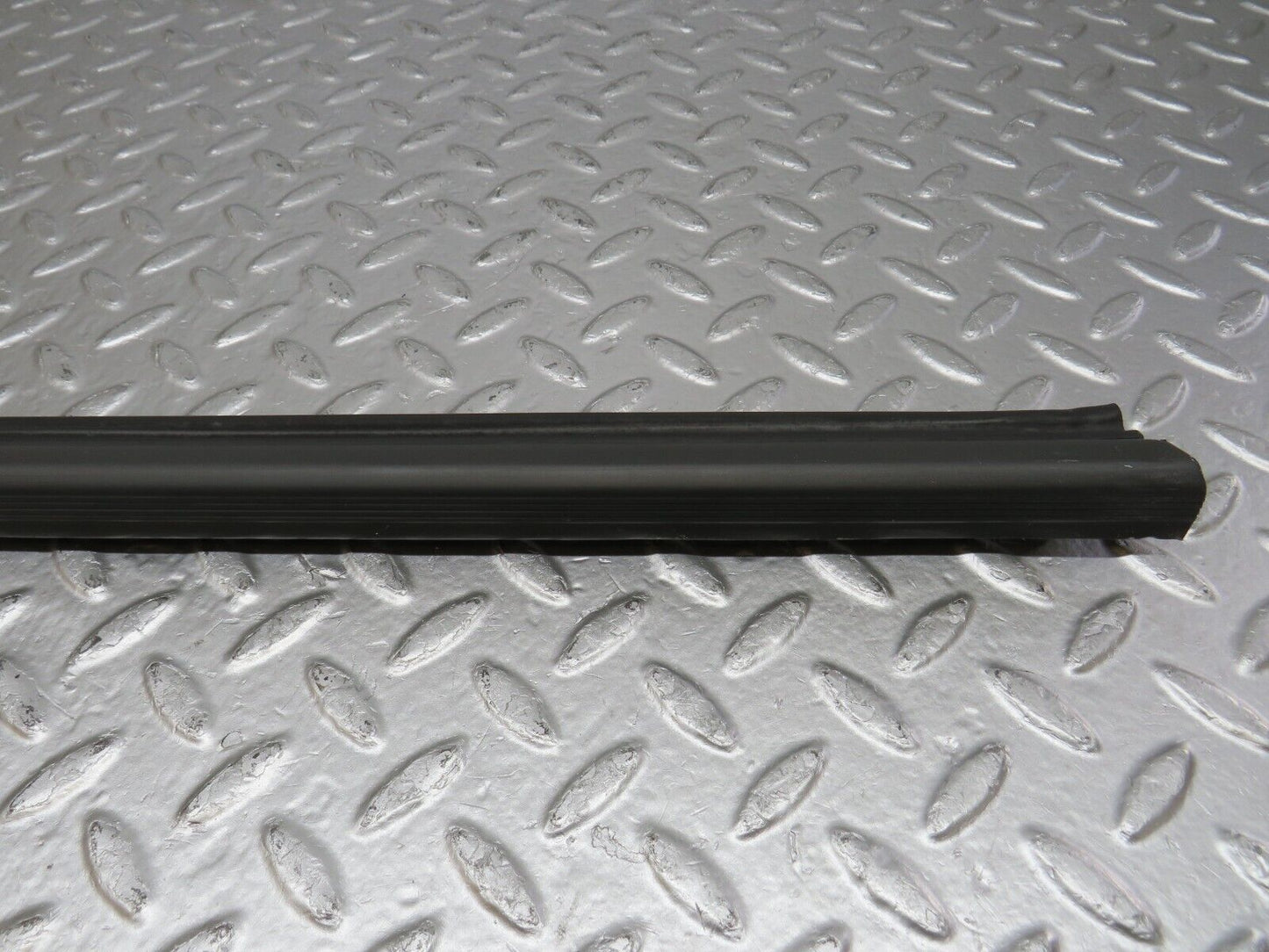 34220 Mercedes-Benz W124 260E Door Lower Sealing Rubber Trim Left