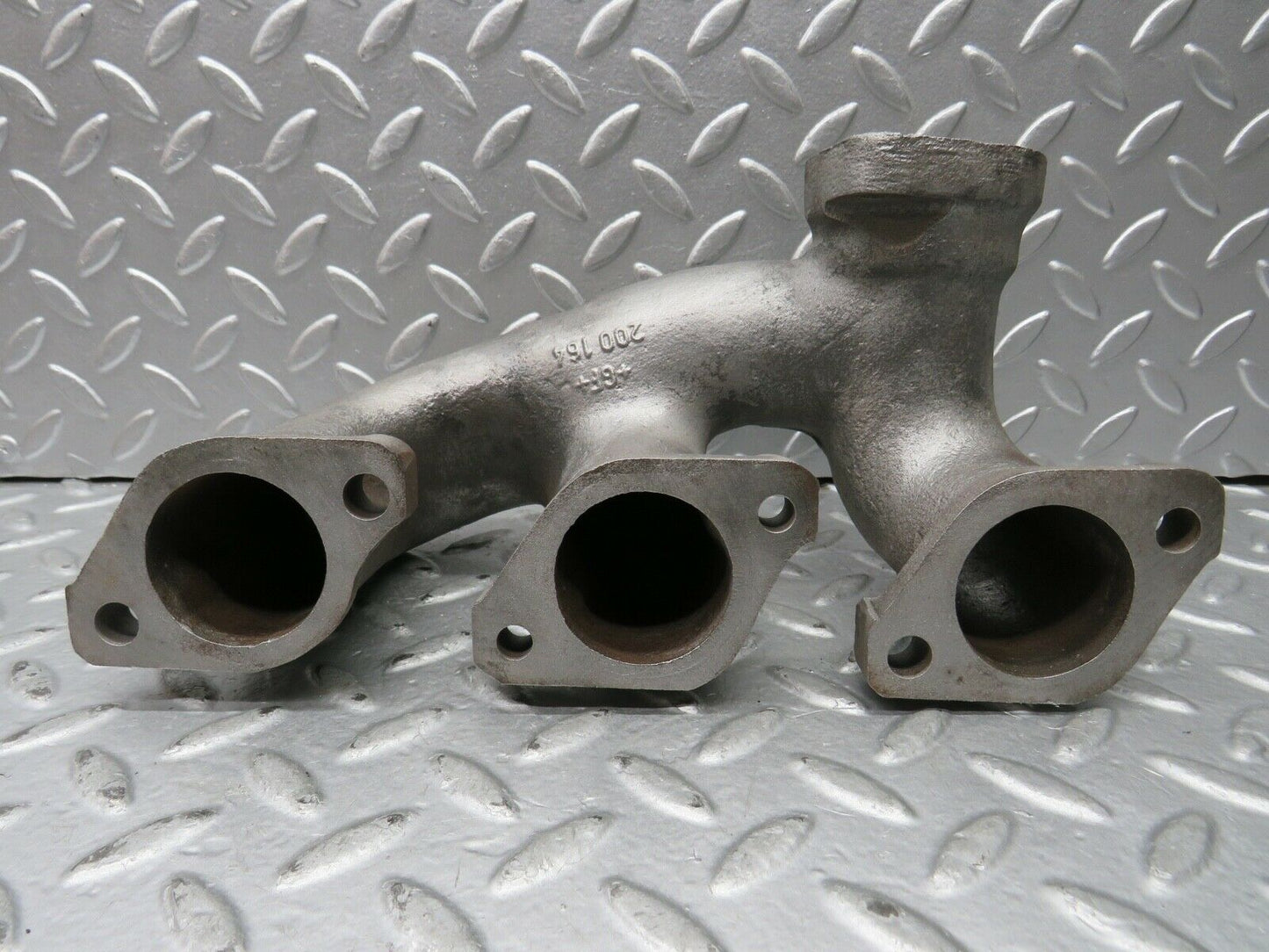 21854 Mercedes-Benz W123 Exhaust Manifold Cylinder 1-3 1101424402