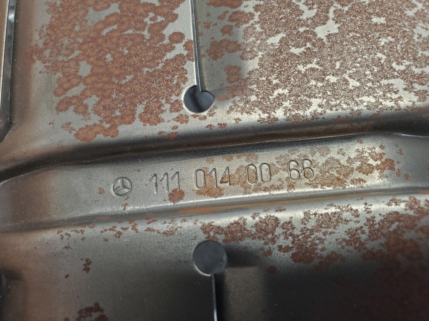 W124 Wagon baffle plate used OEM