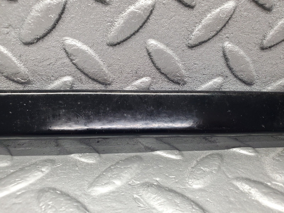 W201 Baby Benz under headlight trim left used OEM