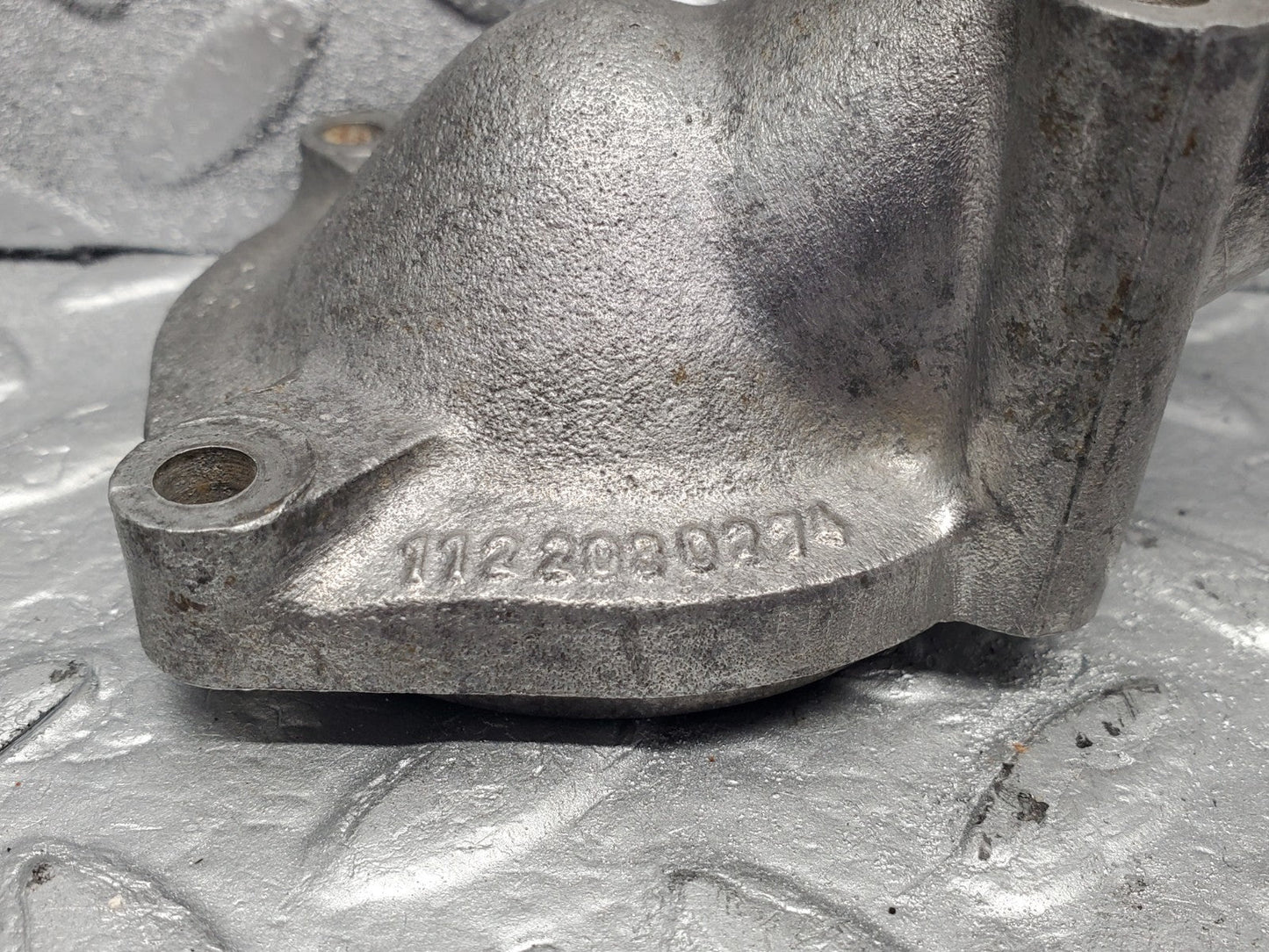W112 thermostat housing used OEM