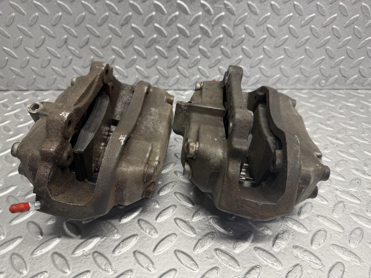R230 front brake caliper right and left used OEM