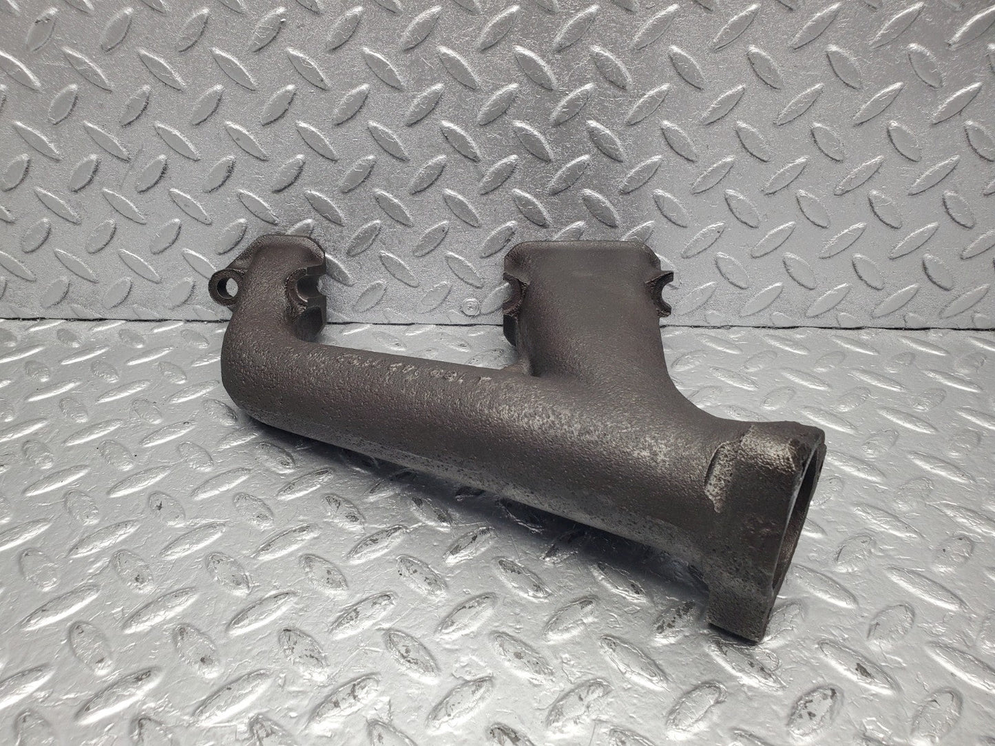 W112 exhaust manifold 4-6 used OEM