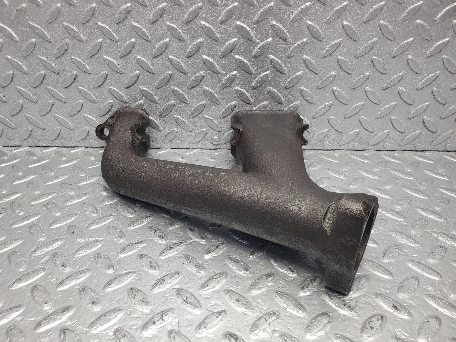 W112 exhaust manifold 4-6 used OEM