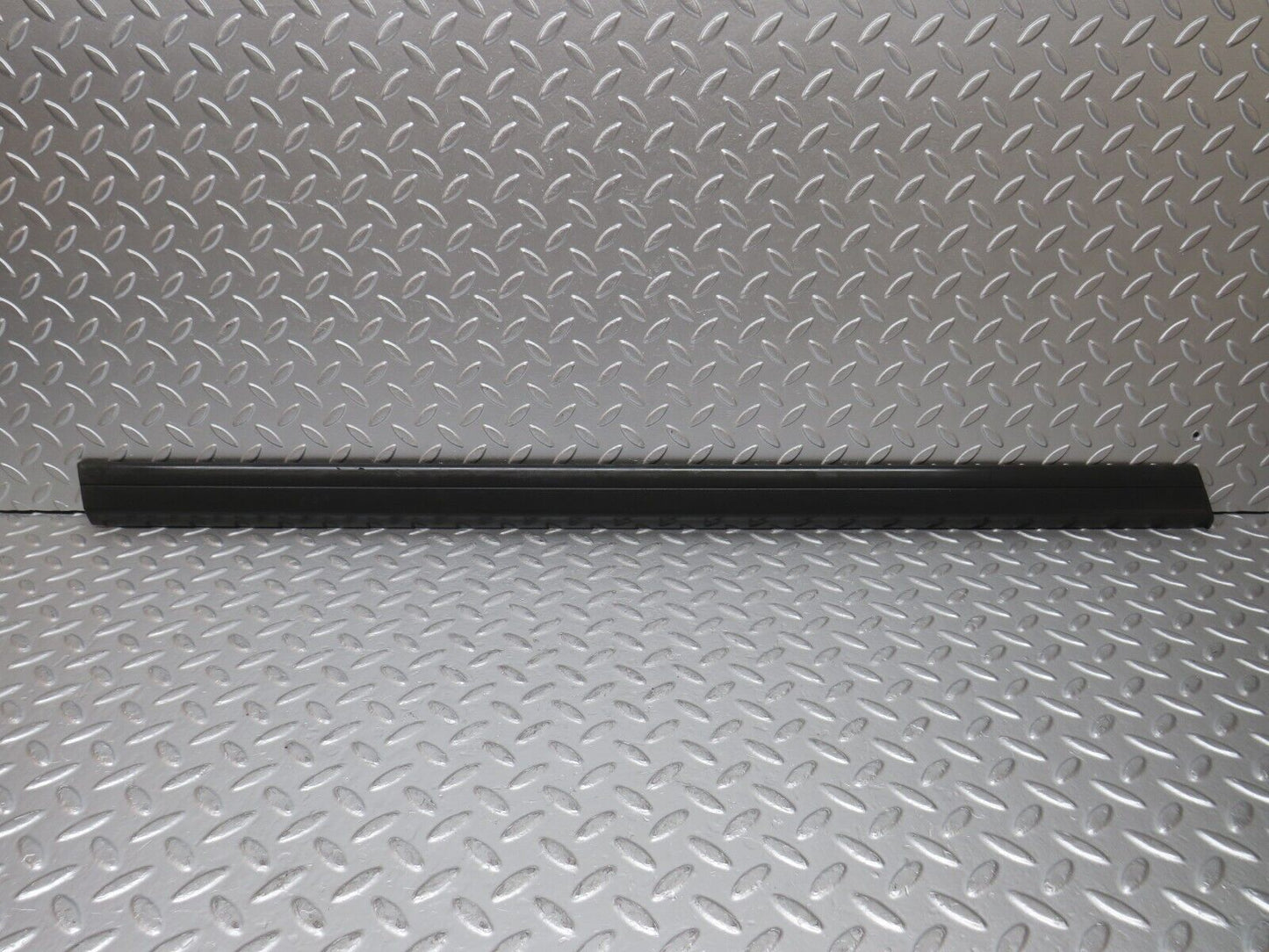 30793 Mercedes-Benz W201 190E 2.0L Front Left Door Lower Moulding Trim