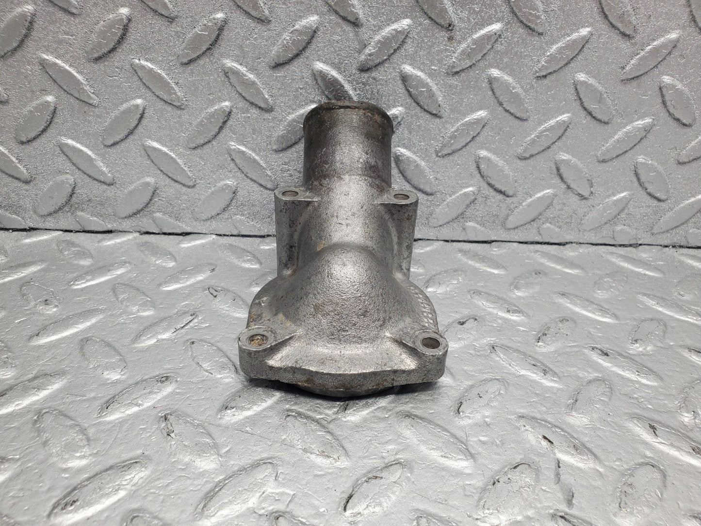 W112 thermostat housing used OEM