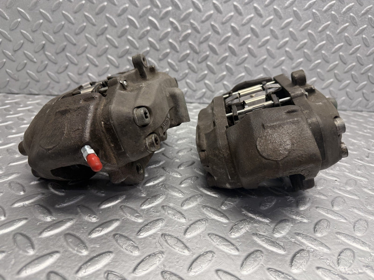 R230 front brake caliper right and left used OEM