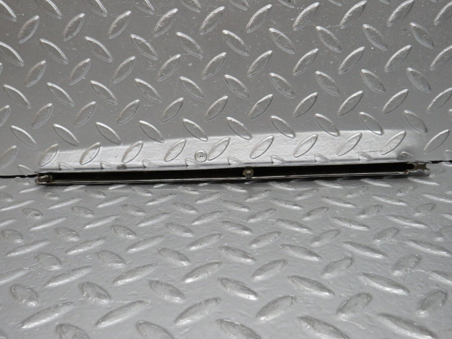 0664 Mercedes-Benz C107 350SLC Coupe Trunk Chrome Handle Moulding Left 1076901380