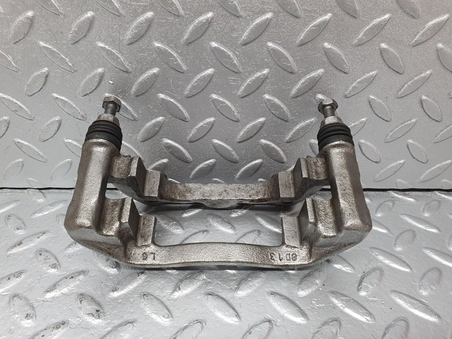 41611 Mercedes-Benz W124 200E Front Right Brake Caliper Bracket