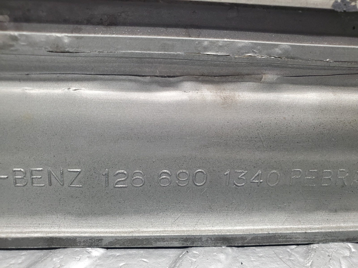 47077158