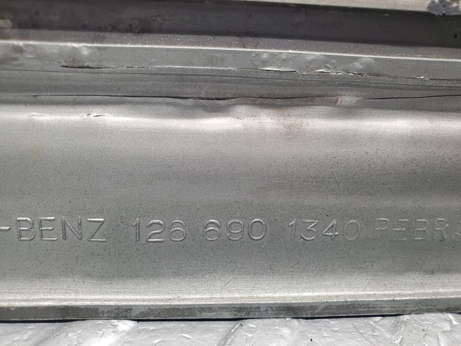 47077158