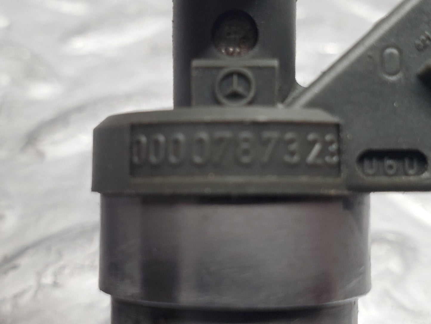 46977100