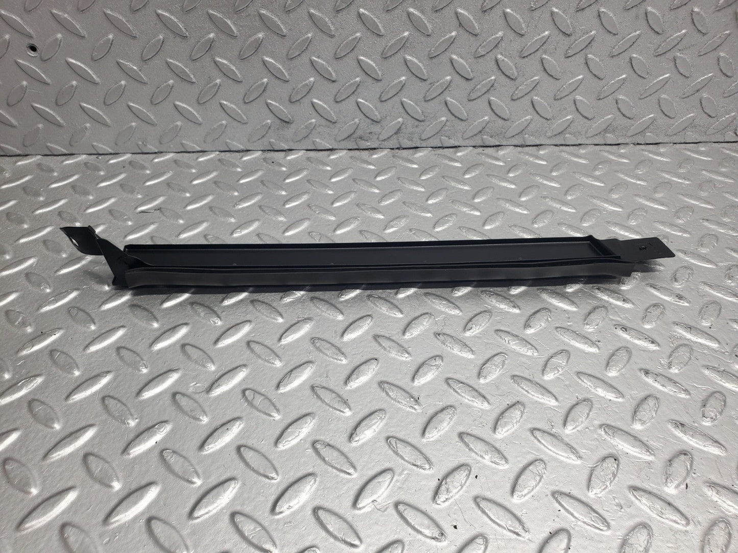 W124 Wagon under headlight trim right side used OEM