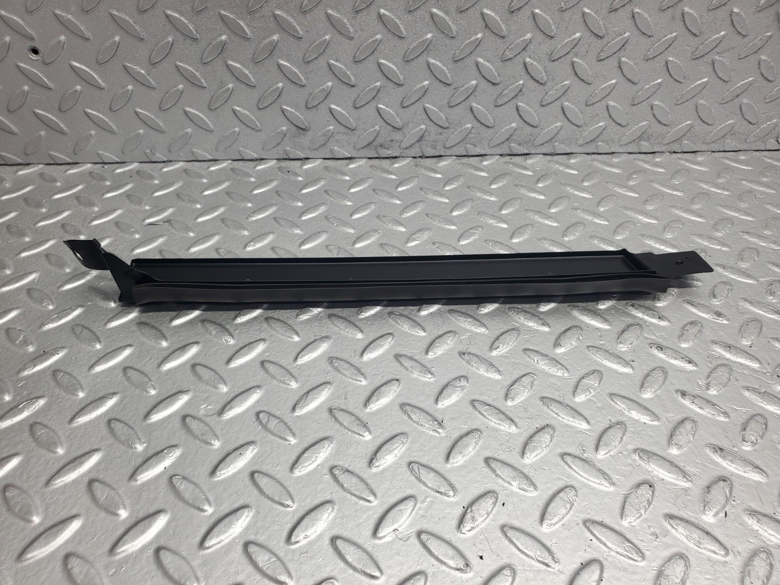 W124 Wagon under headlight trim right side used OEM