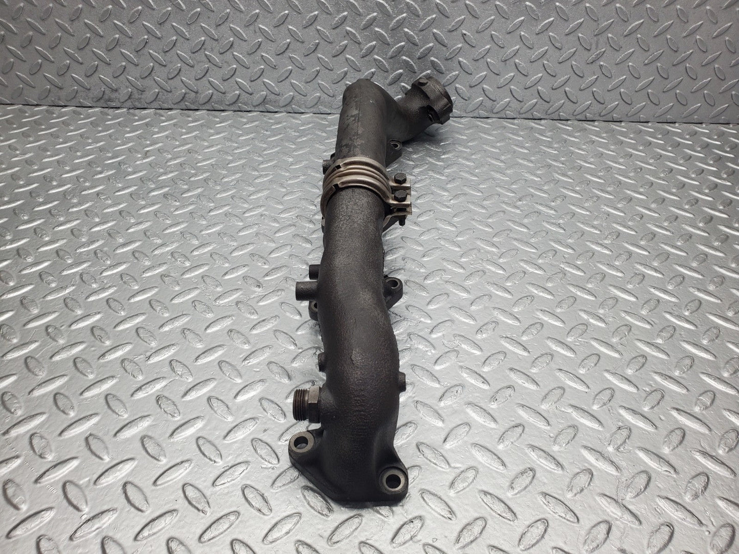 W126 Coupe exhaust manifold left used OEM