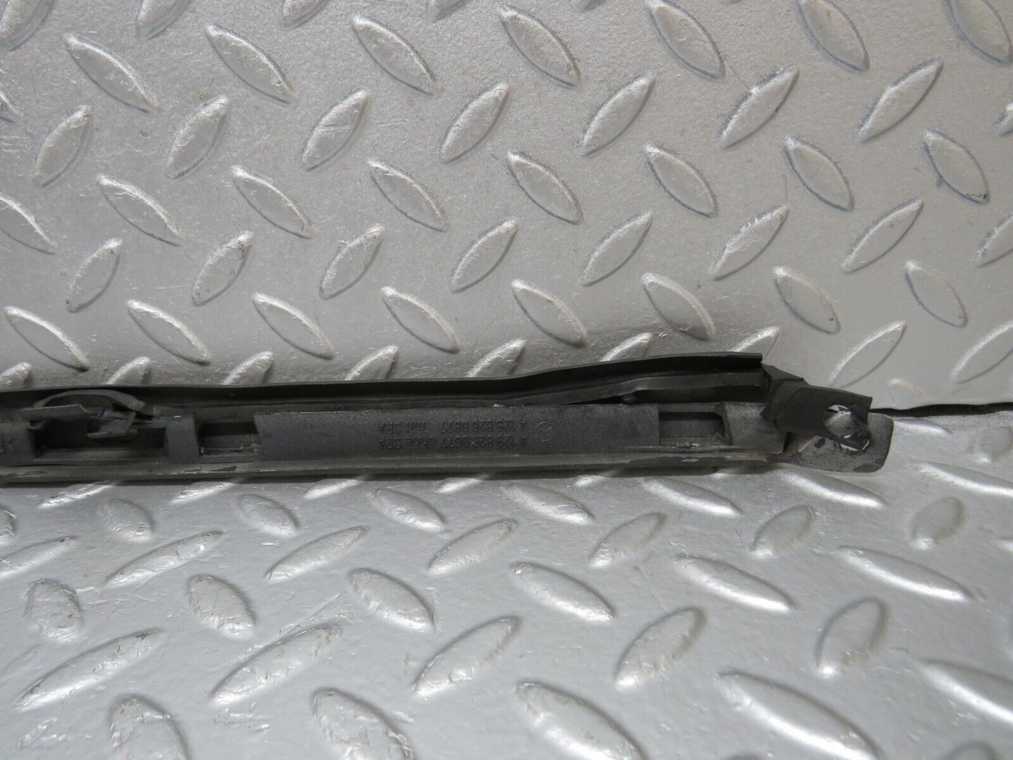 39694 Mercedes-Benz R129 320SL Coupe Right Headlight Lower Trim 1298260677 1298260877