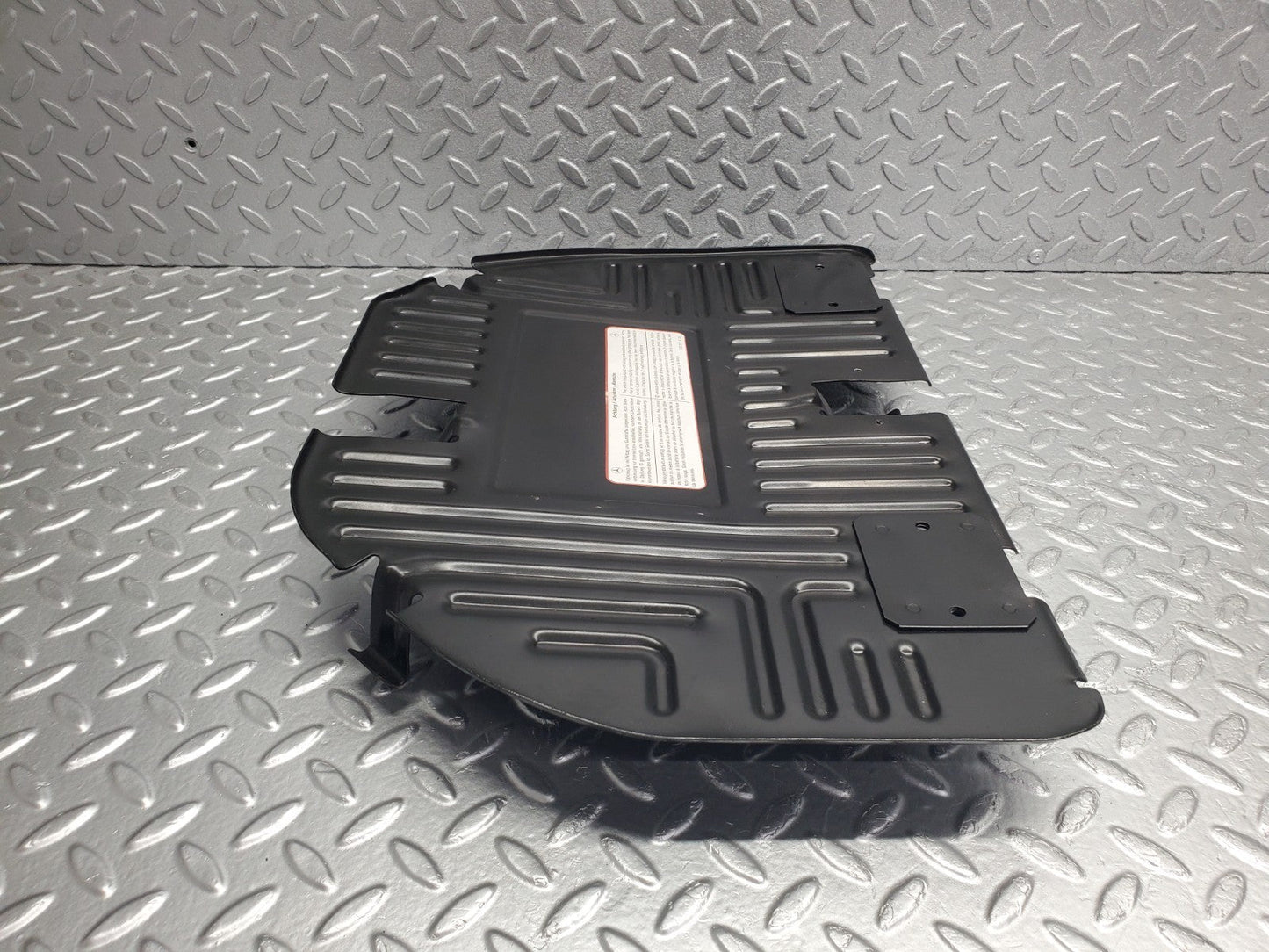 W124 Wagon front right floor relay cover used OEM