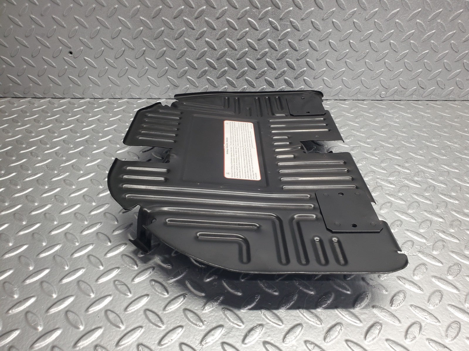 W124 Wagon front right floor relay cover used OEM