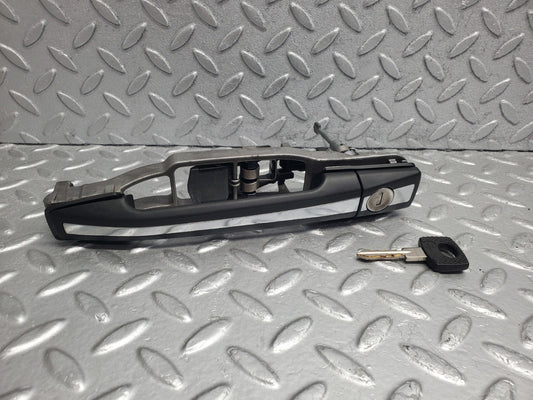 W124 Wagon left door exterior handle with key used OEM