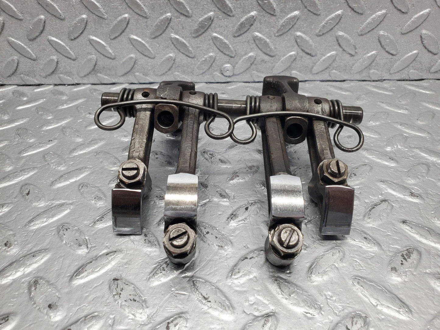 W112 rocker arm support with arm and shaft used OEM